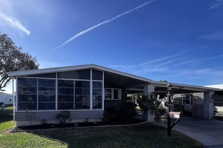 Winter Haven, FL Mobile Home for Sale located at 355 Putter Circle Swiss Golf & Tennis